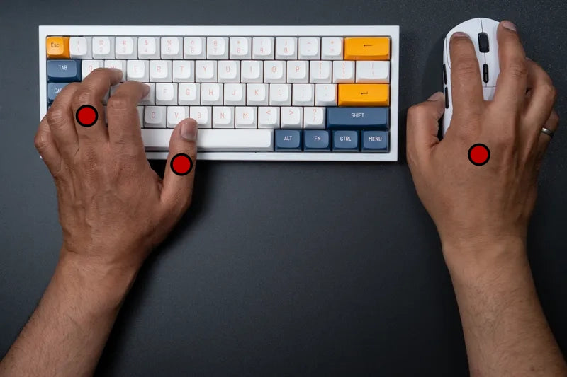 Both hands on a keyboard and mouse, no MaxxStick